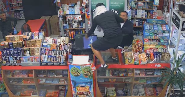 Moment Auckland shopkeeper chases off would-be robbers