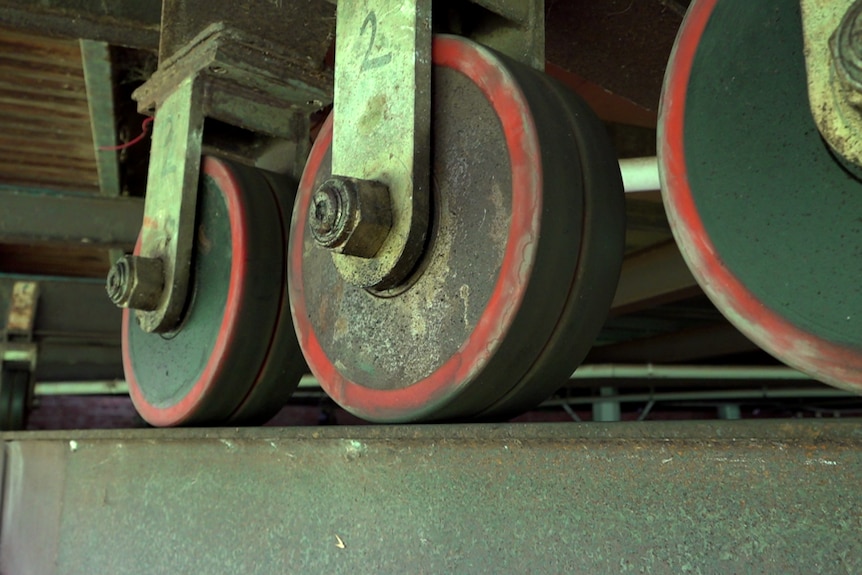 Wheels on a steel track under the house 