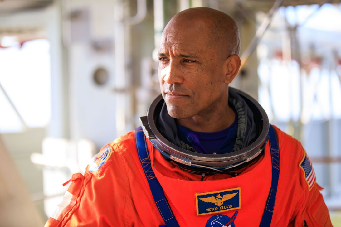 Victor Glover, Artemis II pilot, stands on the mobile launcher at Launch Pad 39B as part of an integrated ground systems test at Kennedy Space Center in September 2023.