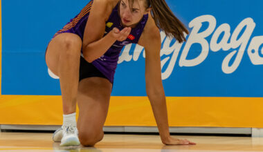 Kelly Jackson tries to catch the blood after coping a nose knock. Image: Simon Leonard