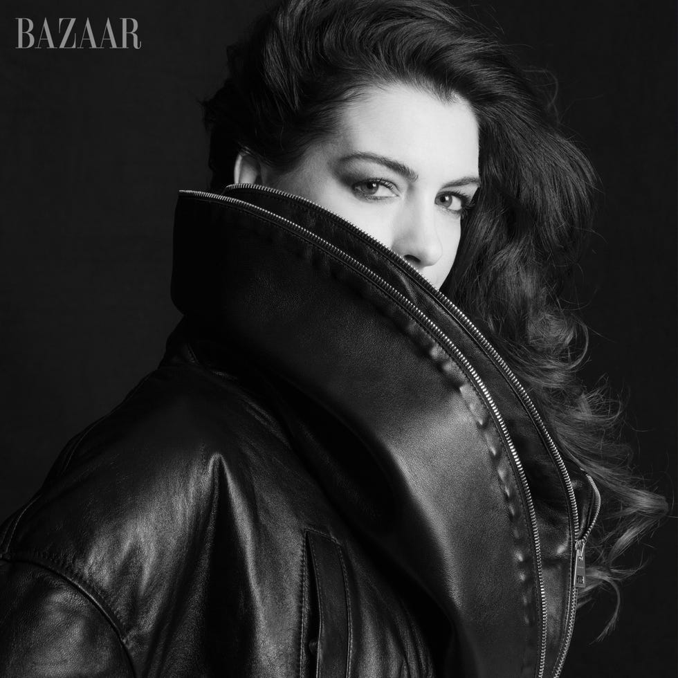 fashion editorial portrait featuring a model in a leather jacket