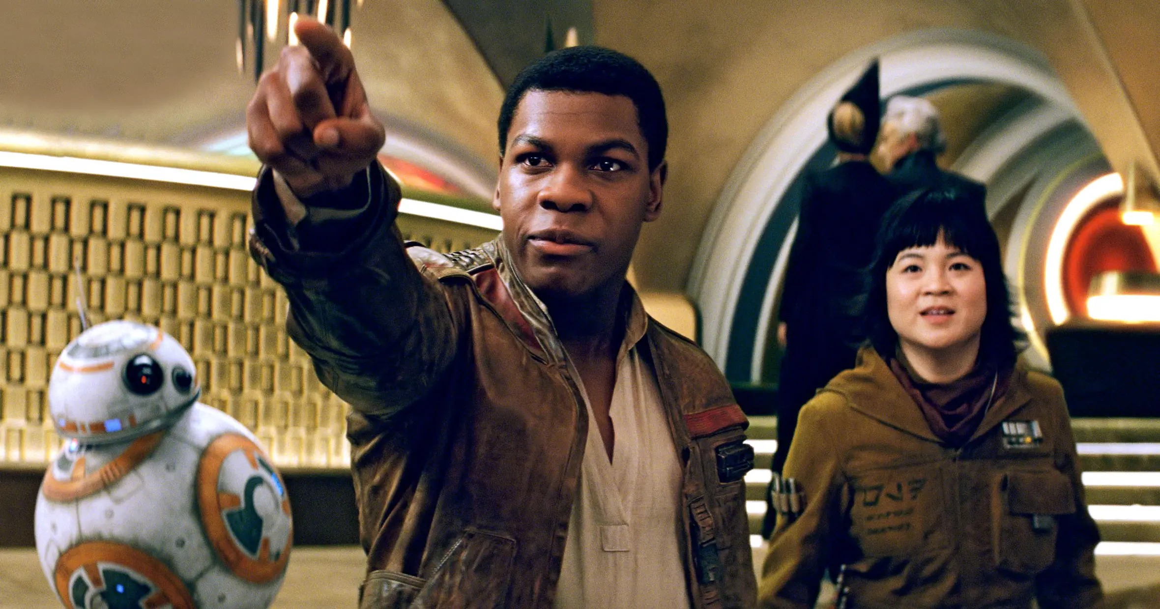 John Boyega as Finn, Kelly Marie Tran as Rose Tico, and BB-8 in Star Wars: The Last Jedi.
