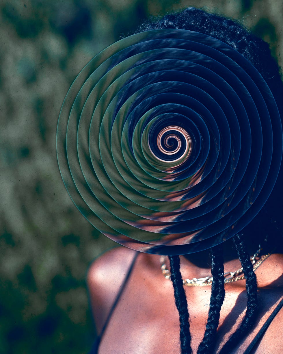 circular optical illusion overlay on a figure with braided hair