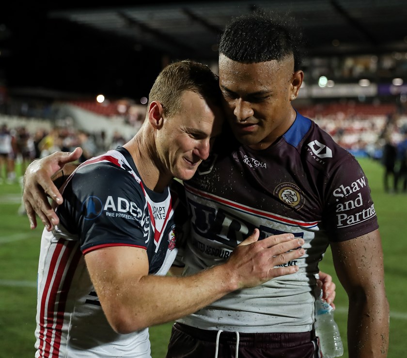 Daly Cherry-Evans and Haumole Olakau'atu share a moment post-game at 4 Pines Park.