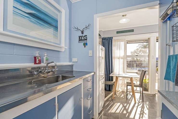 A one-bedroom downstairs unit in the Paradise Coast complex on Barbara Avenue is expected to sell for less than RV. Photo / Supplied