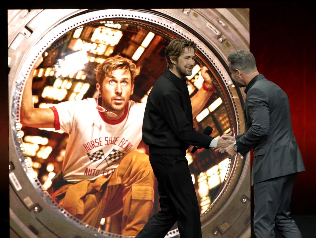 Ryan Gosling (L) is greeted by Amazon MGM Studios Head of Theatrical Distribution Kevin Wilson s they promote the upcoming film "Project Hail Mary" at the Amazon MGM Studios presentation during CinemaCon, the official convention of Cinema United, at The ColosseumÂ at Caesars Palace on April 02, 2025 in Las Vegas, Nevada.