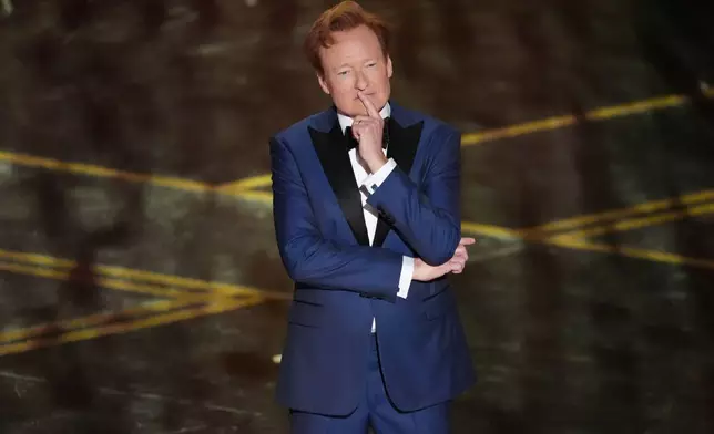 Host Conan O'Brien appears during the Oscars on Sunday, March 15, 2026, at the Dolby Theatre in Los Angeles. (AP Photo/Chris Pizzello)