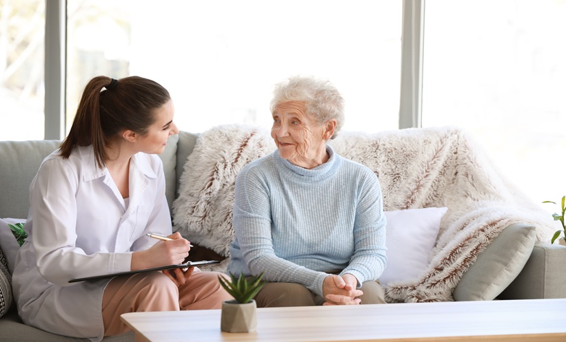 Elderly patient speaking with a doctor during a medical consultation about memory concerns