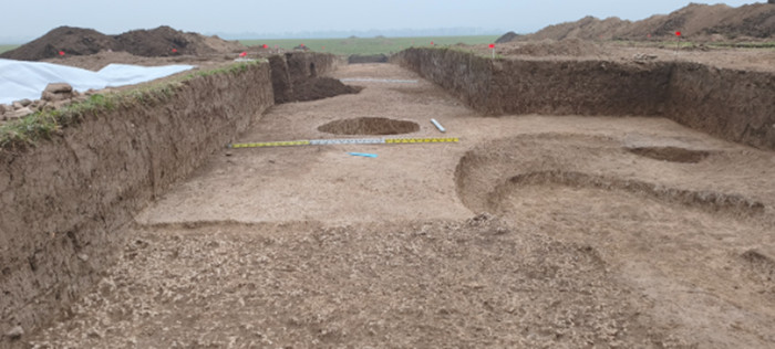View from the west of the excavation site with archaeological sites