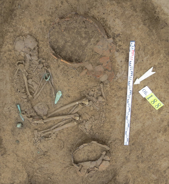 Bronze weapons found alongside male remains at the Khumyk-2 