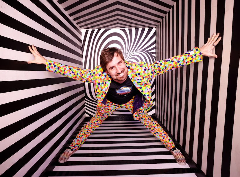 "Rainbow" Rob Andrews poses for a photograph at Rainbow Vomit, the immersive experimental...