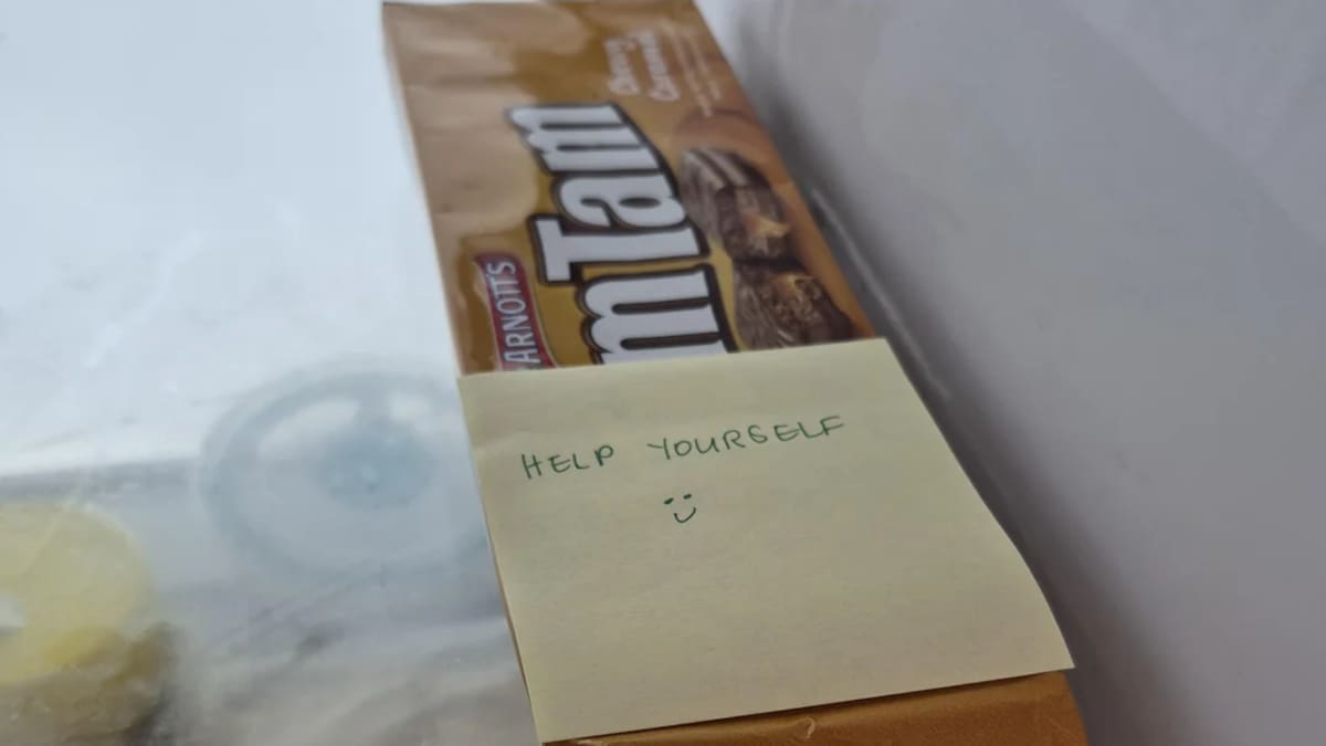 Tim Tam note saying ‘help yourself’ sparks outrage, accusation of theft