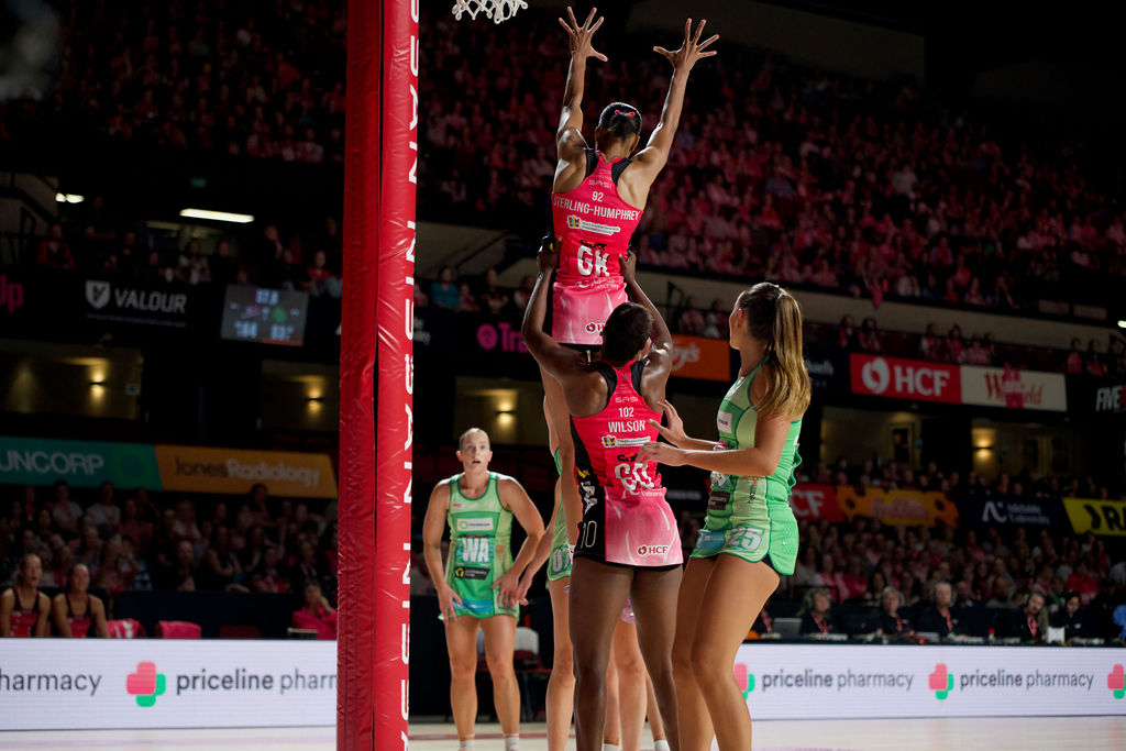 Thunderbirds defenders use the Harrison Hoist over the shot of Sasha Glasgow. Image: Hannah Howard | One The Ball Media