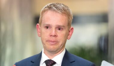 Chris Hipkins arrives back in New Zealand amid questions over ex-wife’s allegations