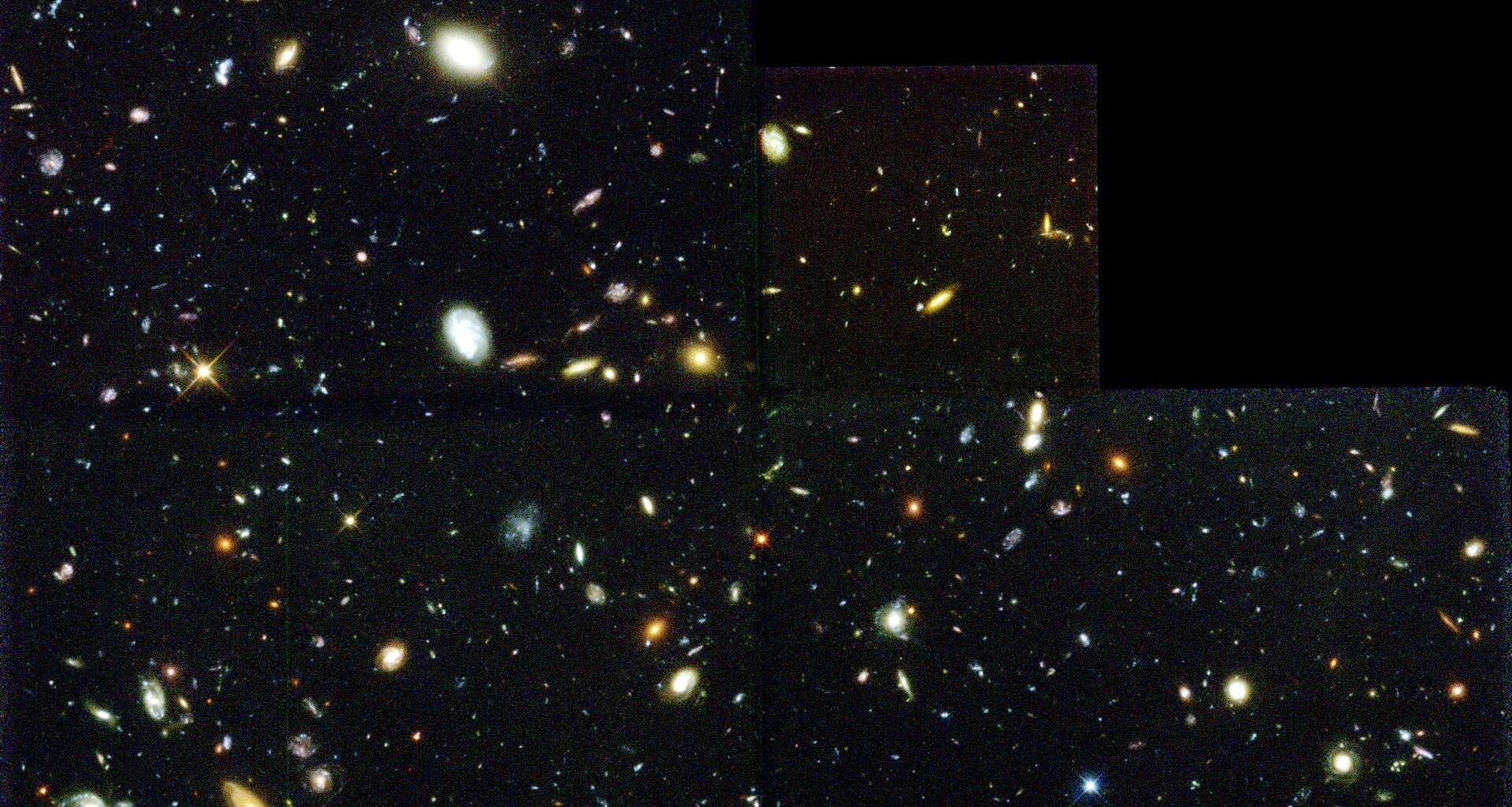 The Hubble Deep Field. Each smudge of light a galaxy containing billions of stars. Measuring how fast the universe is expanding has become one of astronomy's greatest unsolved arguments (Credit : NASA/ESA/STSci)