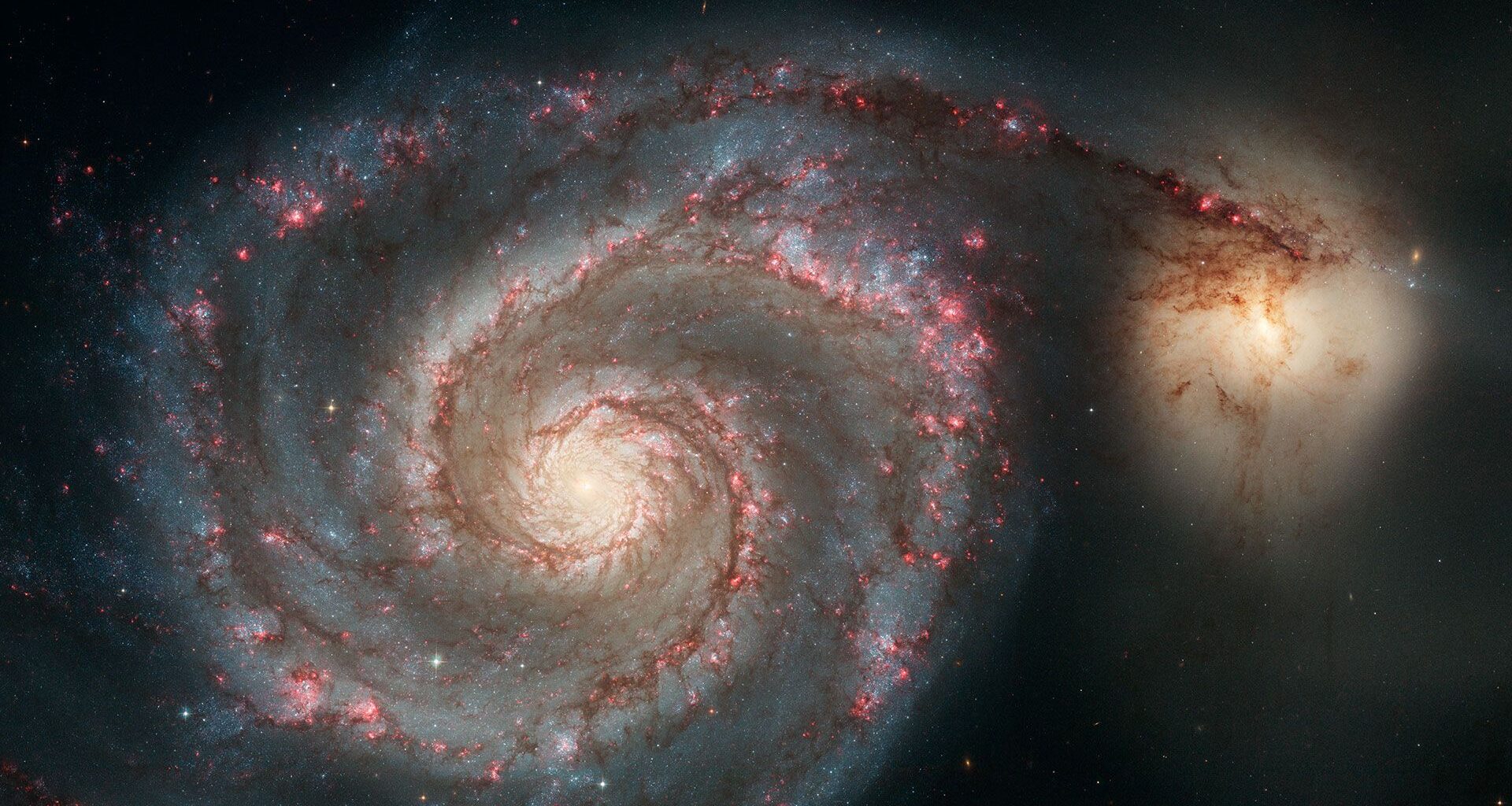 This sharpest-ever image of M51, the "Whirlpool Galaxy," was captured in 2005 with the Hubble Space Telescope.