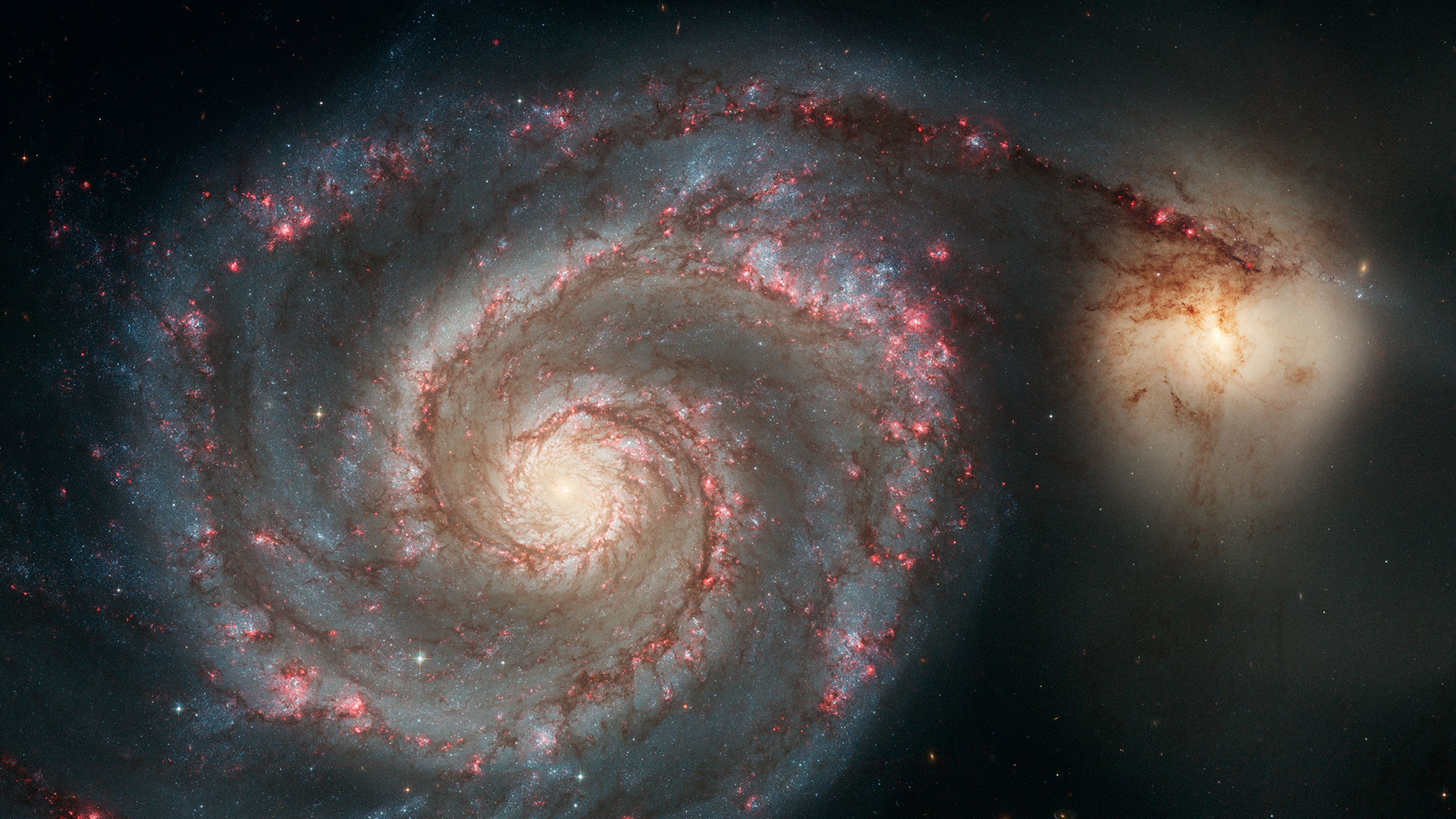 This sharpest-ever image of M51, the "Whirlpool Galaxy," was captured in 2005 with the Hubble Space Telescope.
