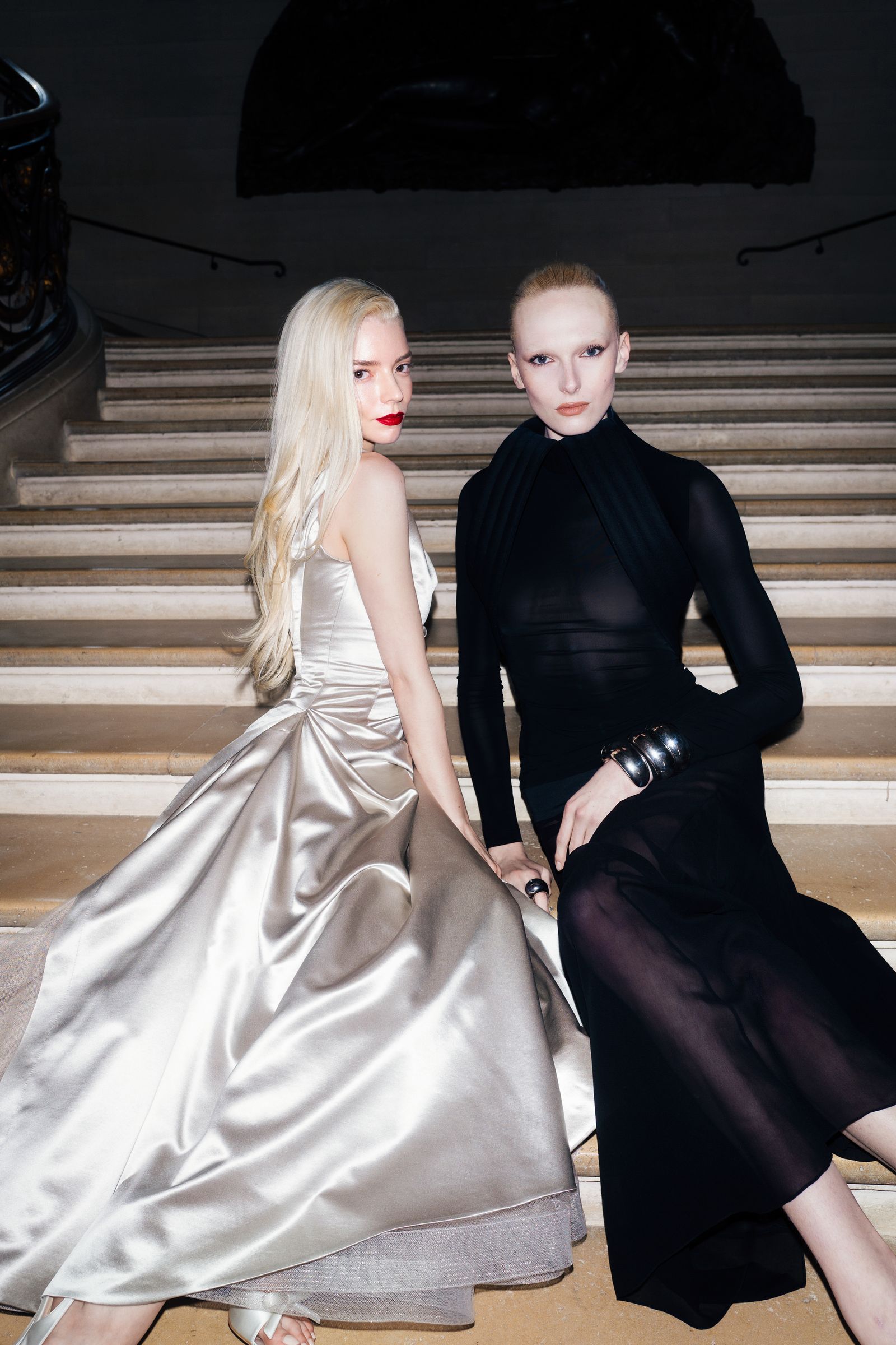 Image may contain Anya TaylorJoy Clothing Dress Person Photobombing Fashion Architecture Building and House