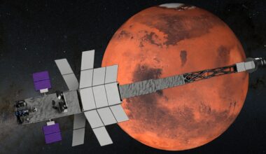 a long rectangular spaceship in front of reddish orange planet