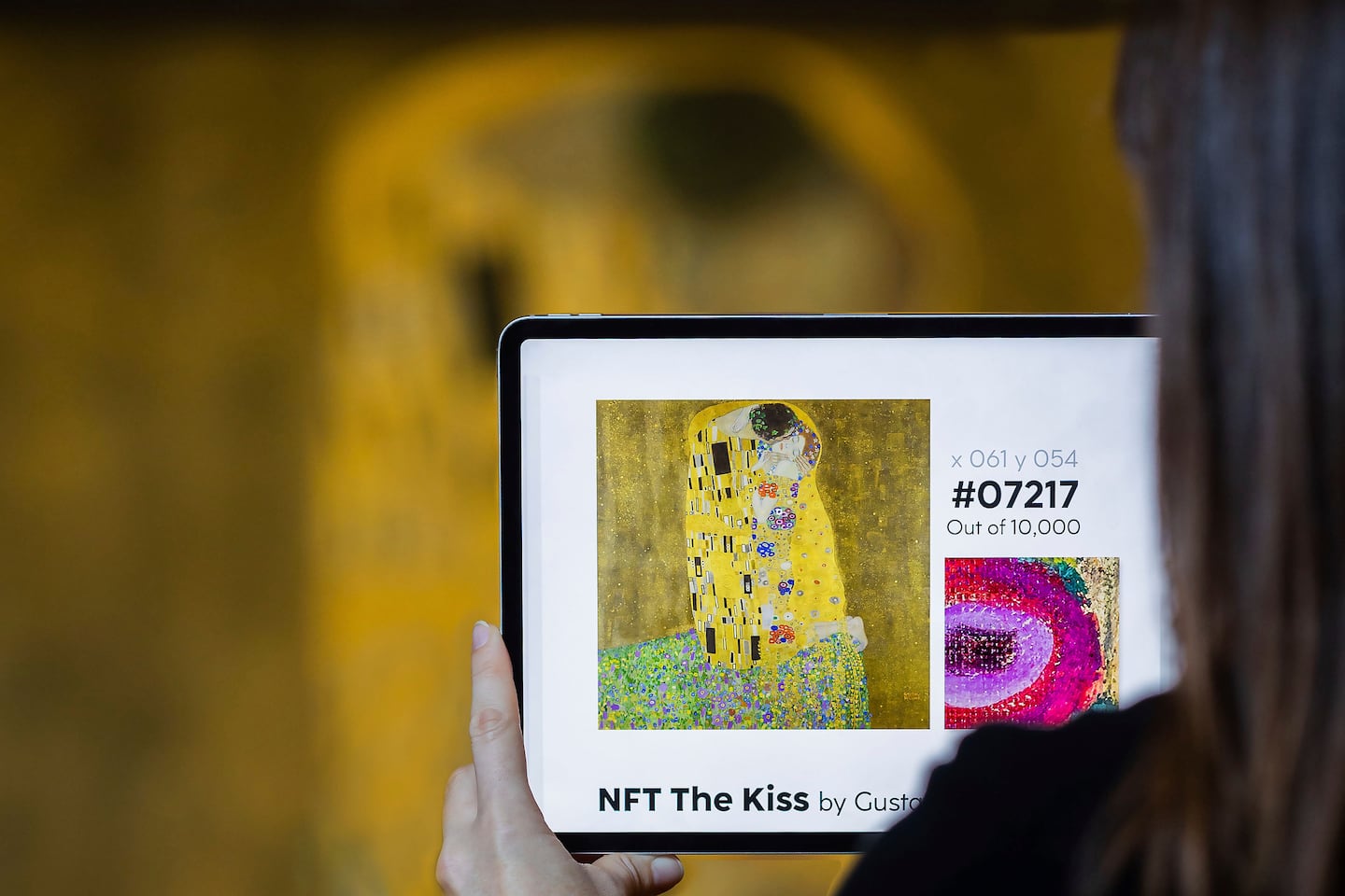 In this image released on Tuesday, Feb. 8, 2022, NFT presentation "The Kiss" by Gustav Klimt at the Upper Belvedere Gallery, Austria. 