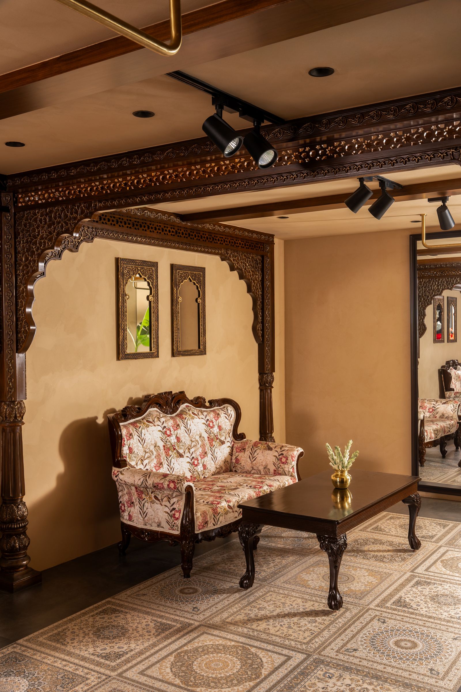 Image may contain Indoors Interior Design Home Decor Furniture Rug Architecture Building Living Room Room and Plant