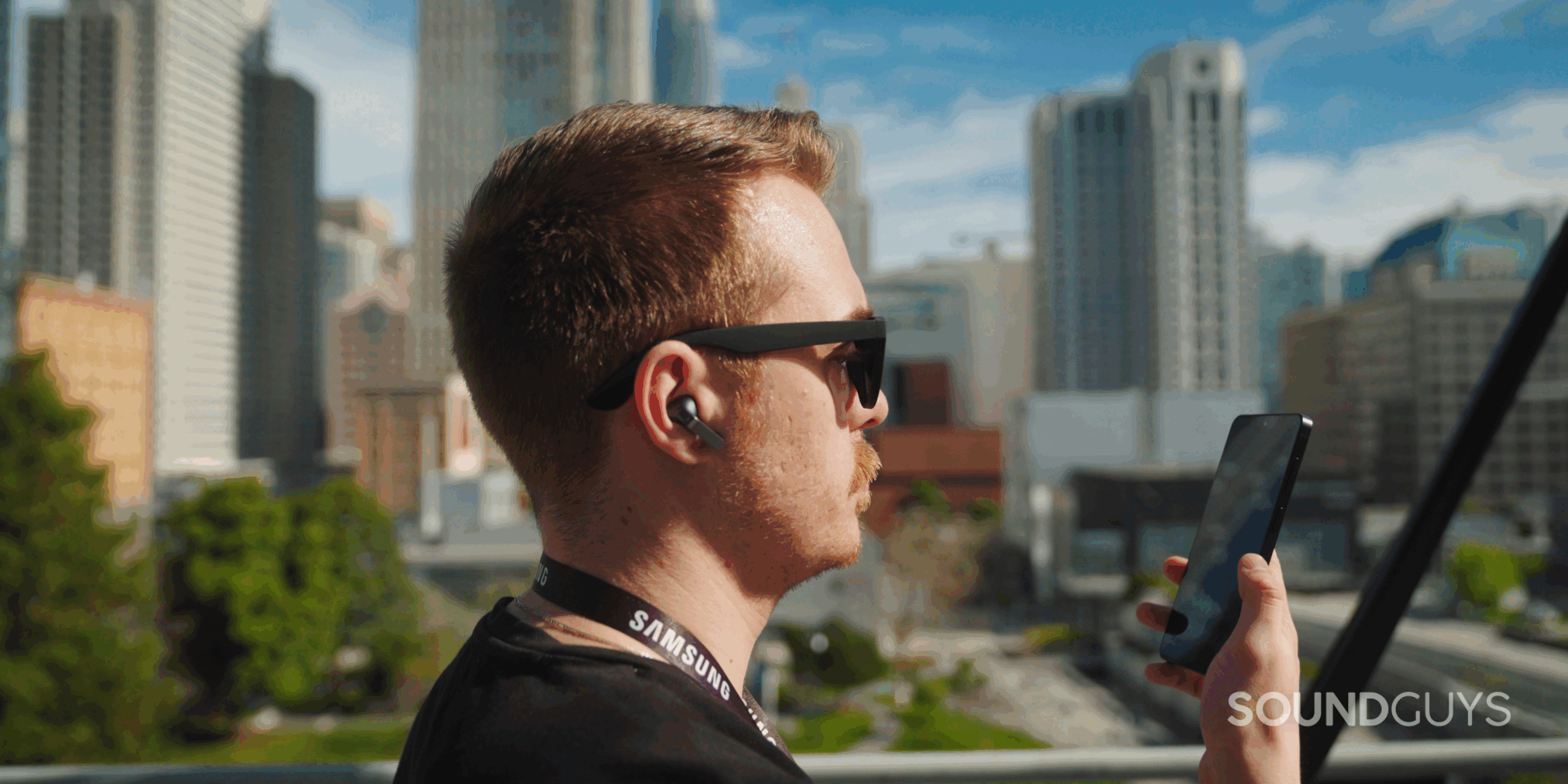 A man wearing the samsung galaxy buds4 pro.