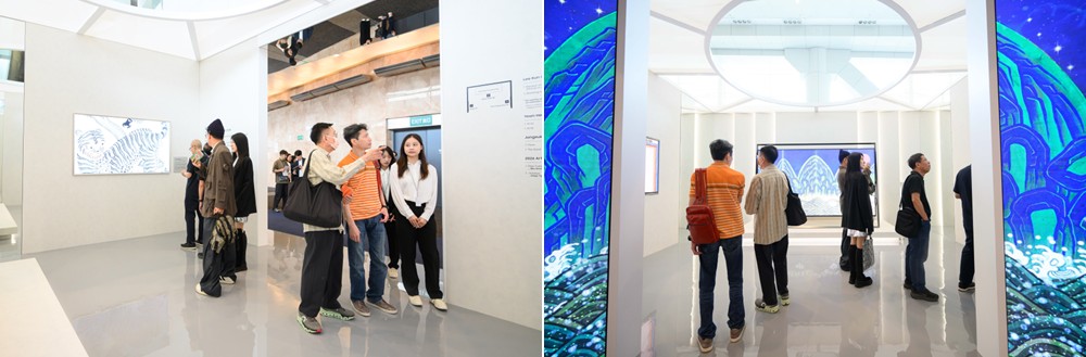Visitors engaged with artworks displayed across the exhibition including Samsung Art TVs.