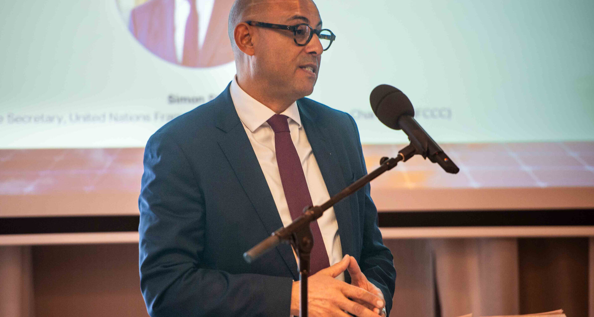 Simon Stiell, executive secretary of the U.N. Framework Convention on Climate Change, speaks during the Green Growth Summit in Brussels on Monday. Credit: Michael Chia/UNFCCC
