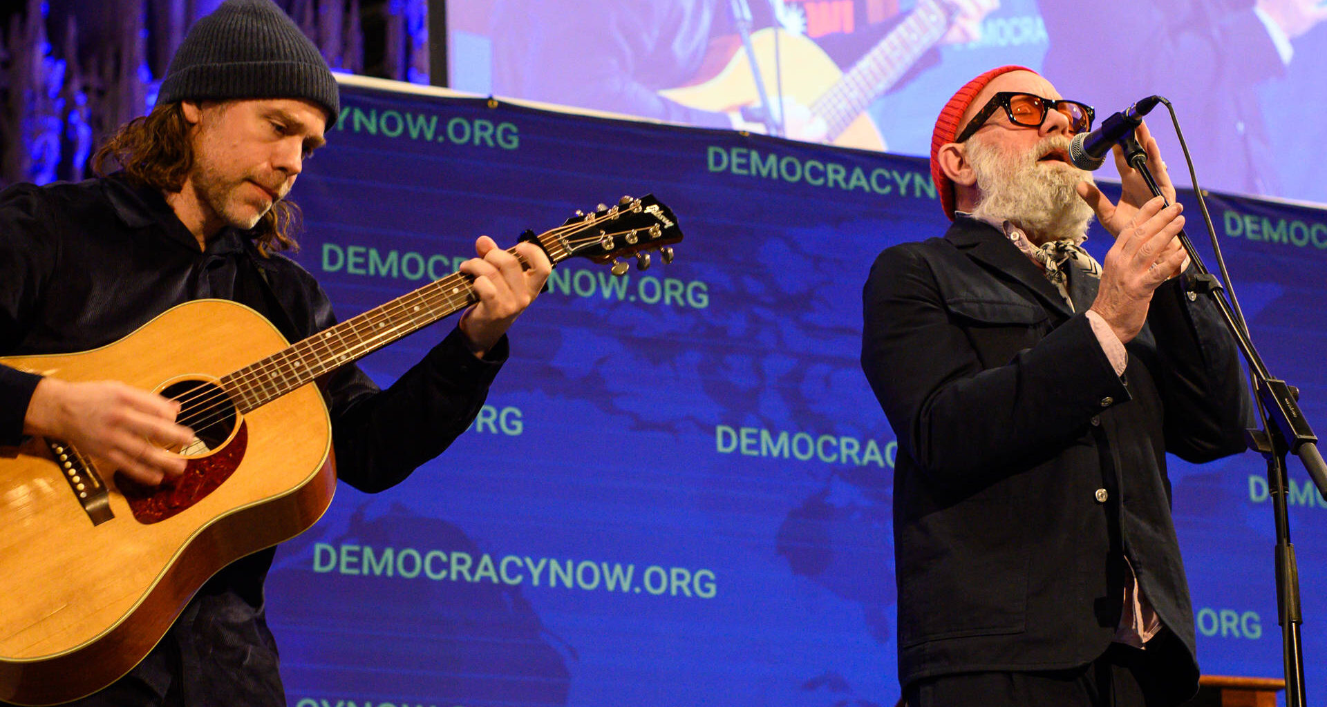 Michael Stipe & Aaron Dessner Perform “No Time for Love Like Now” at Democracy Now! Celebration