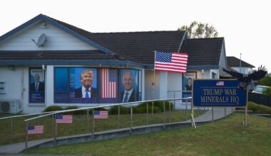 Chris Luxon’s Botany office targeted in Greenpeace protest with Trump image, US flags; police investigate