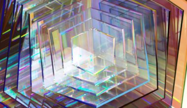 A series of hexagonal clear pieces, reflecting rainbow prisms