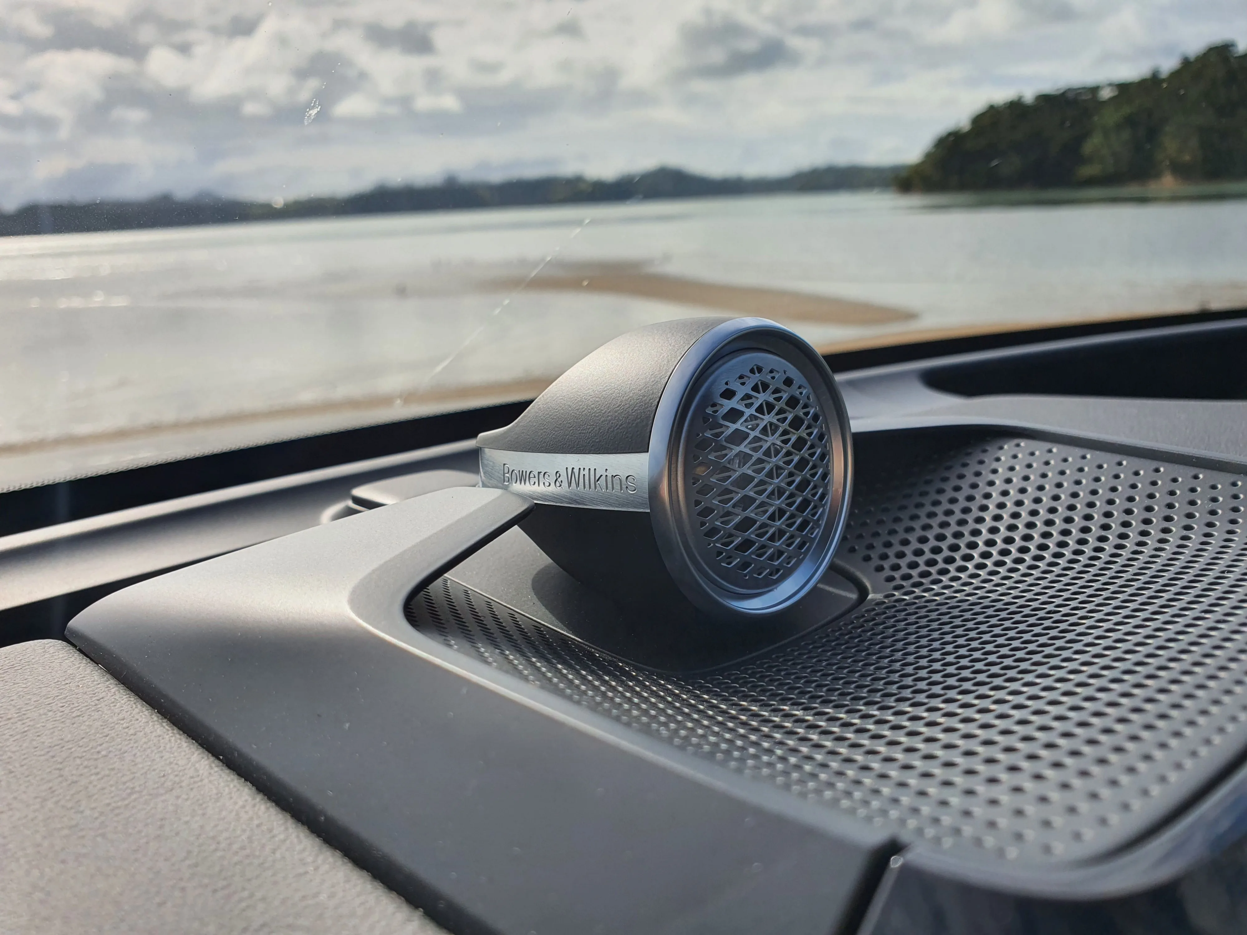 Bowers & Wilkins branded tweeter sits atop the dashboard of a 2026 Volvo EX90.