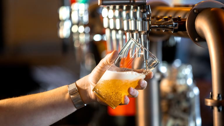 A beer being poured at a bar (stock image).
