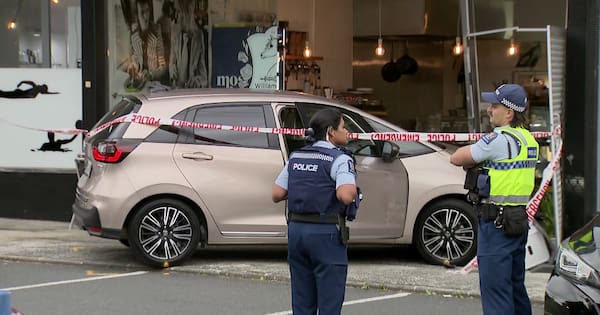 Woman dies after car crashes into cafe on North Shore
