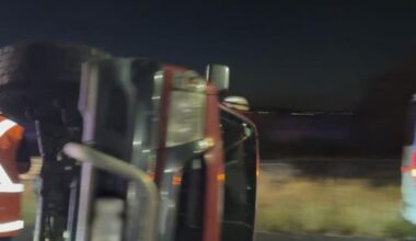 Commuter woes after car flipped onto its side on Auckland's SH1