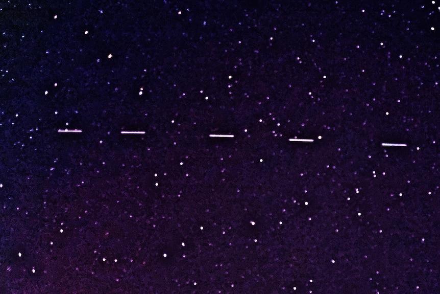 A night sky with lines across it