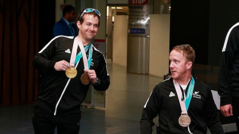 Corey Peters and Adam Hall arrive home at Auckland Airport from the PyeongChang Paralympic Games in Korea. 21 March 2018.