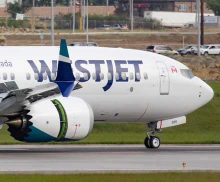 Close up of WestJet Boeing 737 MAX 8 on the runway