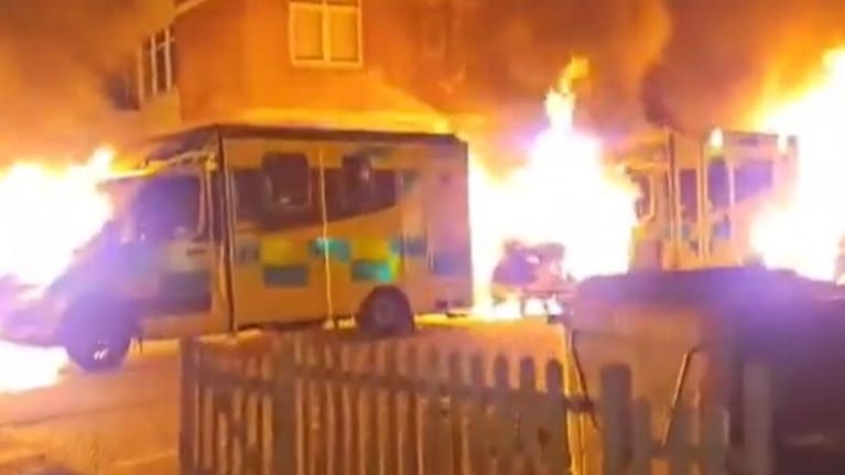 Ambulances on fire in London.