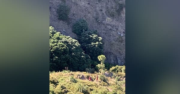 Person critical after falling as far as 15m from cliff onto rocks