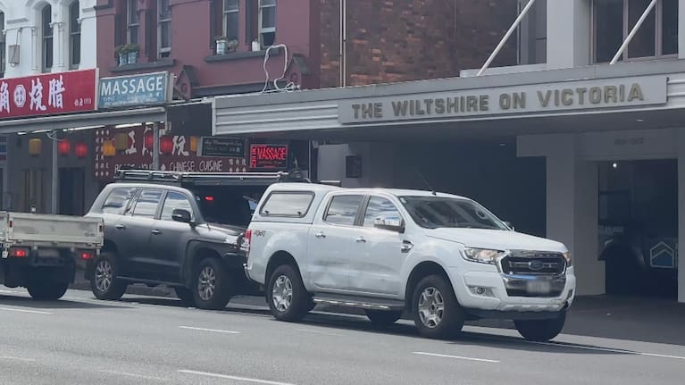 An unmarked police car appears to try ramming a ute being pursued by officers.