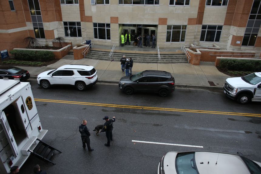 Police arrive outside Old Dominion University's campus after reports of an active shooter on Thursday, March 12, 2026, in Norfolk, Virginia. (AP Photo/John Clark)