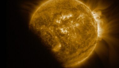 A yellow orb with loops coming out of it and hazy rays all around is slightly blocked by a shadow toward the bottom left of the screen.