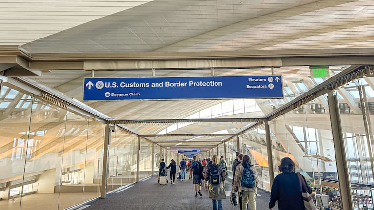 Arrivals walking towards US Customs and Border Protection at Los Angeles International Airport