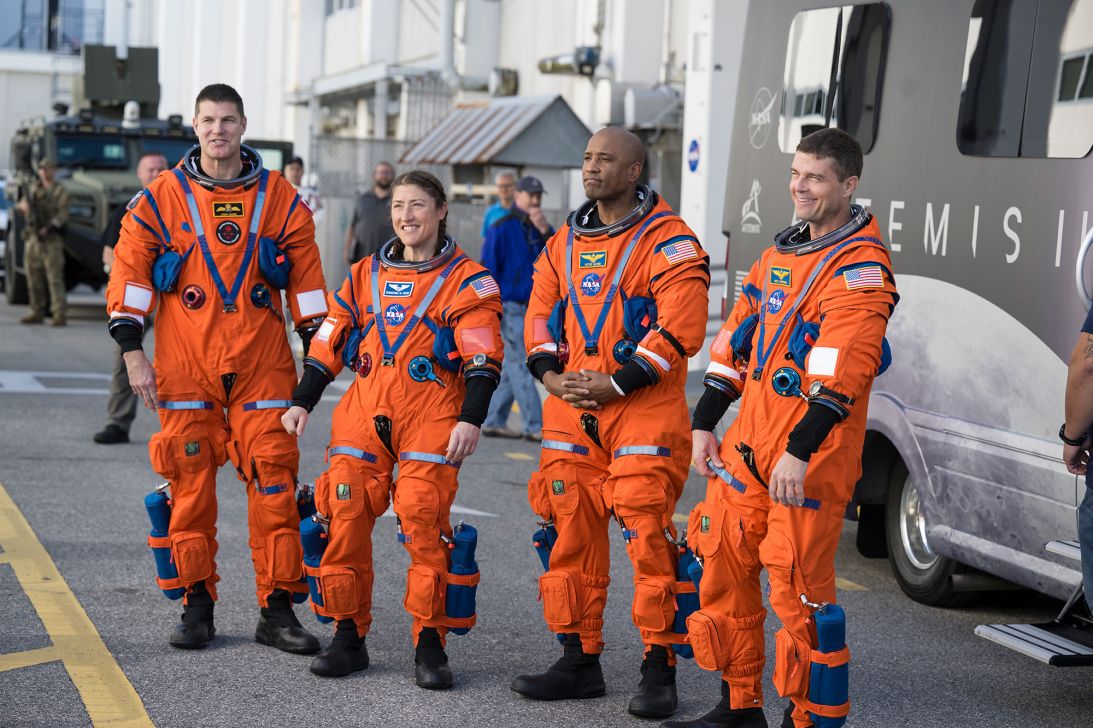 Artemis II crew members (from left) Jeremy Hansen, Christina Koch, Victor Glover and Reid Wiseman are seen on their way to board the Orion spacecraft as part of a demo test in December.