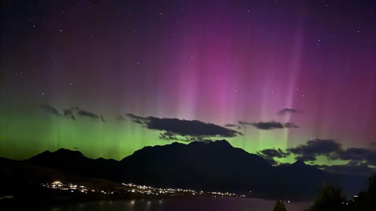 Purple and green light up Queenstown