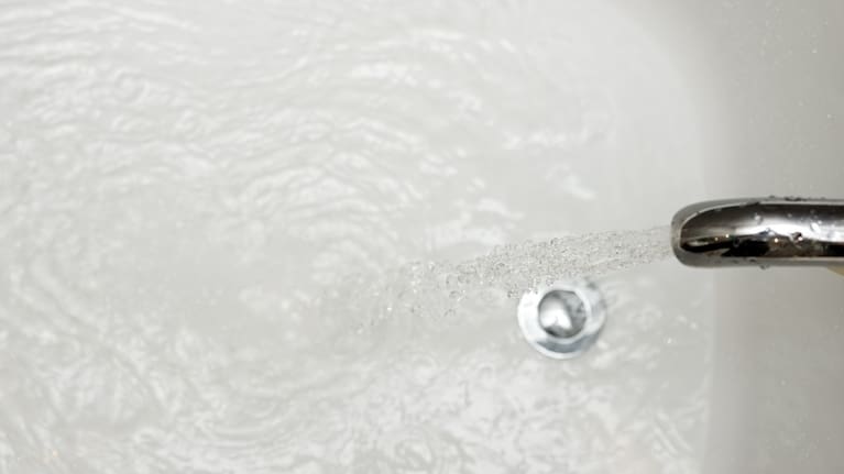 A bath being filled. 