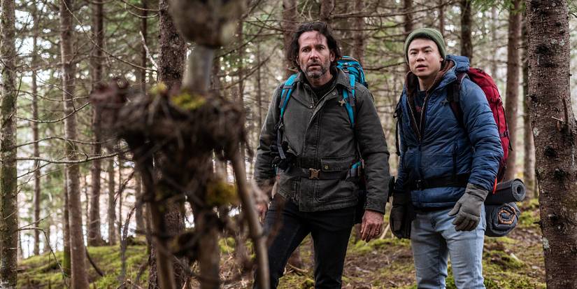 Two men find a creepy stick doll in the woods in From Season 3