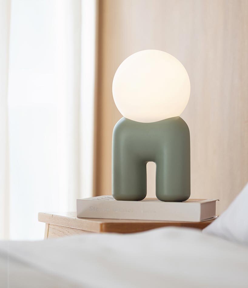 buddy portable mood lamp encourages interaction through a single wind-up key - 2
