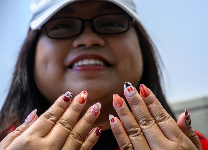 Sweet Tappan, a BTS fan, poses at BTS Pop-up: ARIRANG in Seoul, Korea, Friday, one day before the band's comeback concert at Gwanghwamun Square in central Seoul. Korea Times photo by Shim Hyun-chul